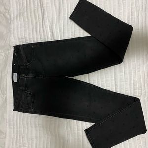 Black polka dot skinny jeans